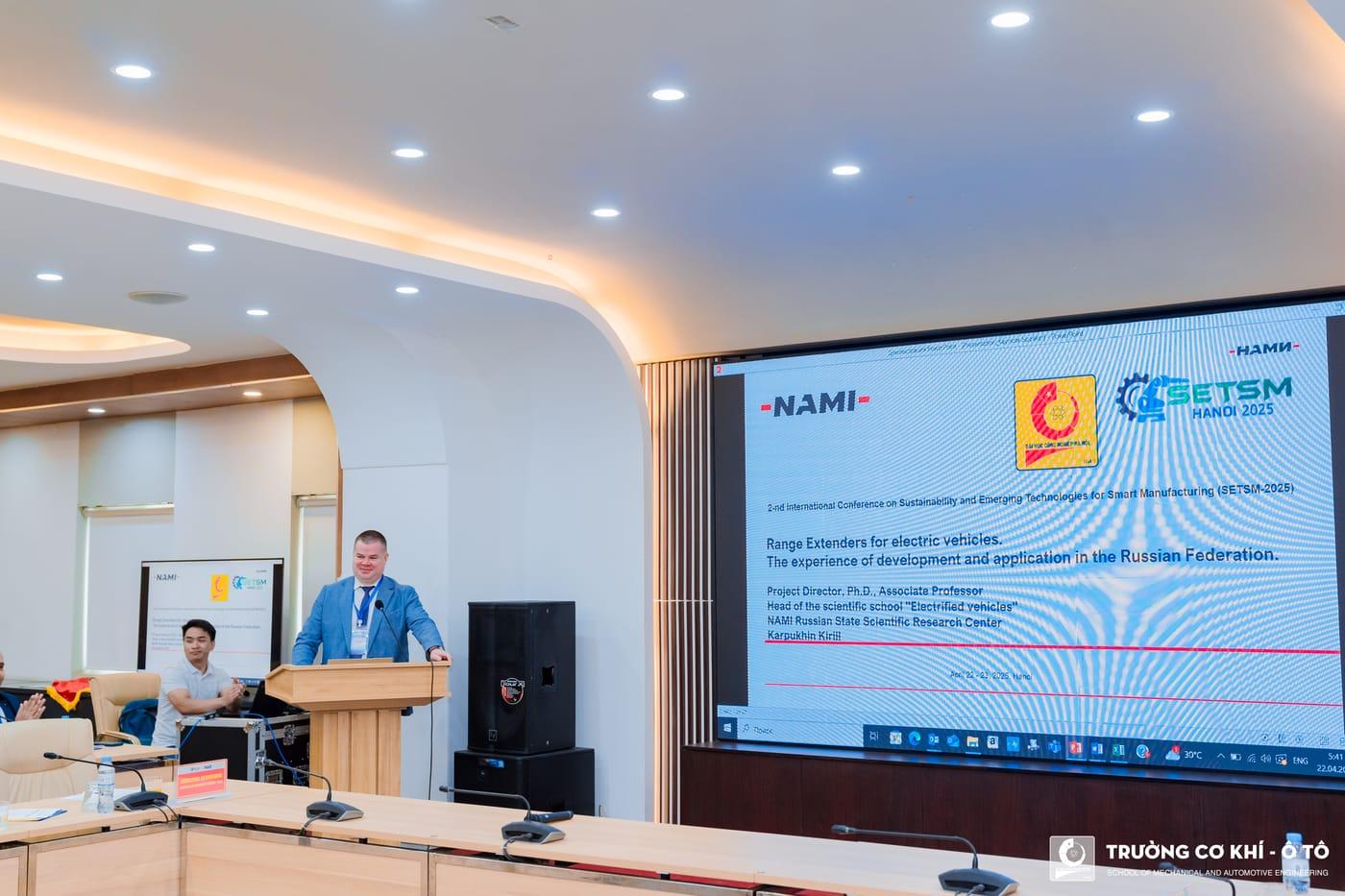 An invited speaker presenting during a technical session