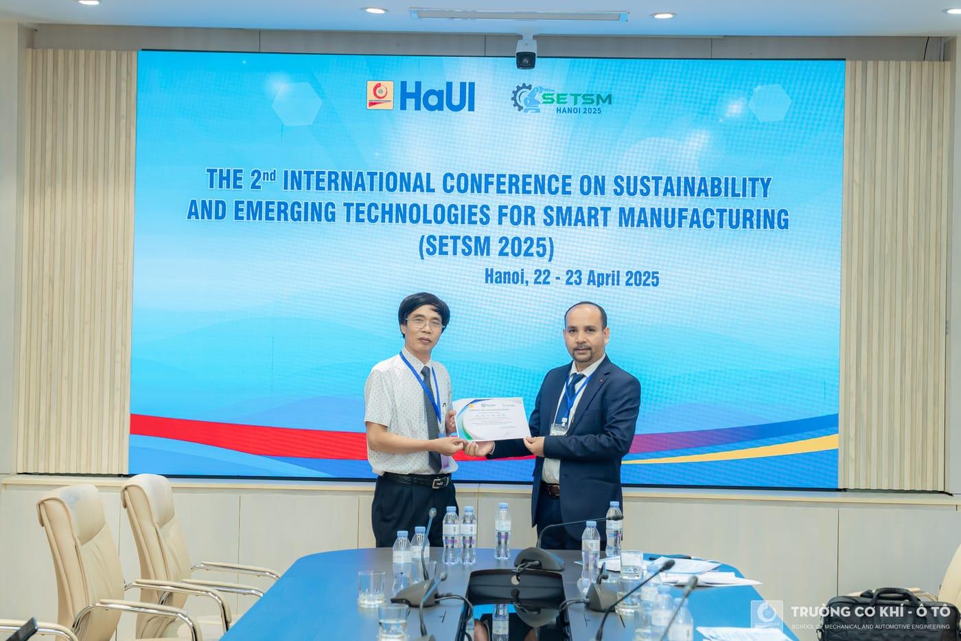 A presentation ceremony at the conference table